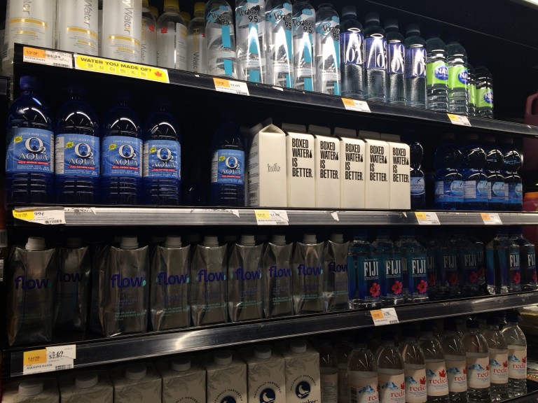 Green package design Boxed water stands out from the crowd